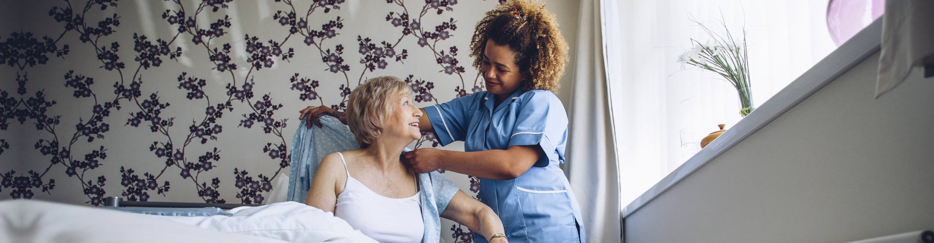 caregiver assisting to her patient